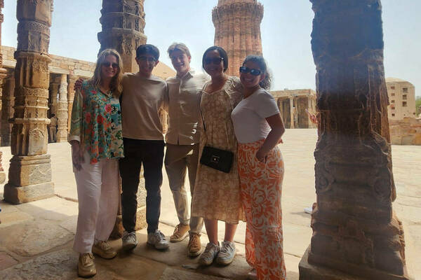 Visiting the Qutub Minar in Delhi, the tallest brick minaret in the world.